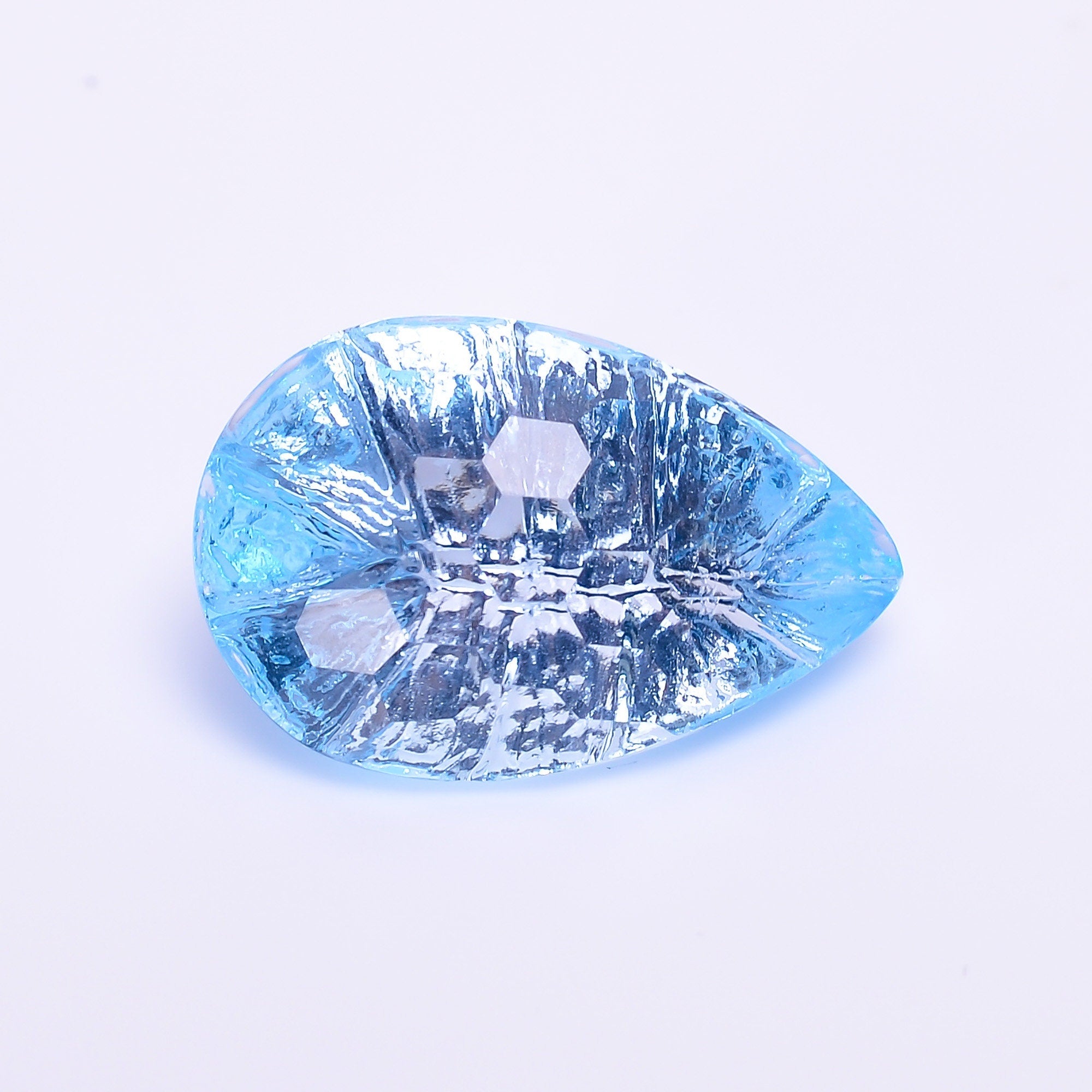 natural blue topaz pear shape fantasy cut loose gemstone